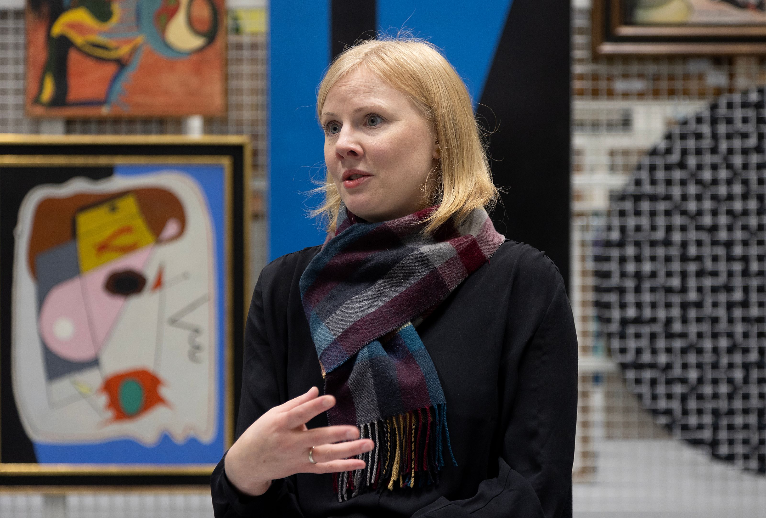 Curator Hanne Cecilie Gulstad explaining the Tangen Collection